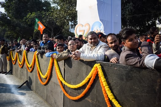 New Delhi, India - January 16 2023 - Thousands of people collected during Prime Minister Narendra Modi BJP road show, people during PM Modi big election rally in the capital photo