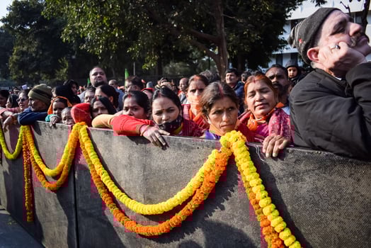 New Delhi, India - January 16 2023 - Thousands of people collected during Prime Minister Narendra Modi BJP road show, people during PM Modi big election rally in the capital photo