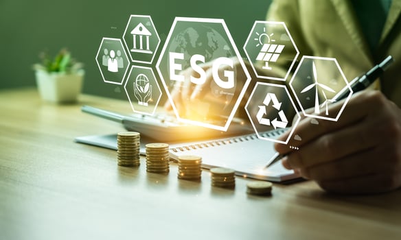 ESG environment social governance investment concept. Businessman using computer to analyze investment ESG. strategy that considers the environmental, company carbon labor practices, sustainability photo