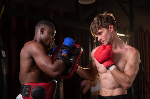 Two foreign boxers are practicing Muay Thai. to prepare for the real fight on stage,  Muay Thai, Thai martial arts that foreigners are interested photo