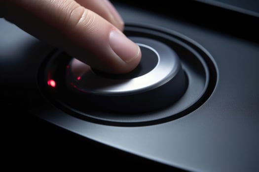 Round shaped button with sign. Finger about to press a button. Hardware equipment. photo