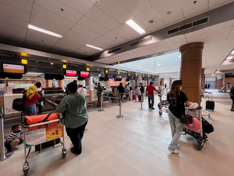 people waiting to board plane at Praya Lombok airport. Lombok, Indonesia, March 22, 2022 photo
