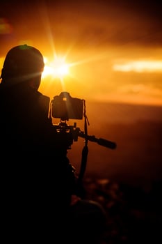 Taking Pictures at Sunset photo