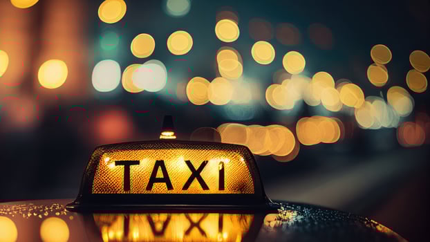Taxi sign. Night city. photo