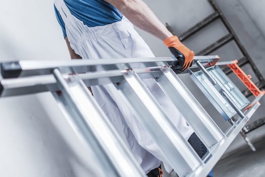 Construction Worker with Ladder photo