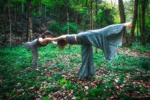 Sports yoga in nature with two girls photo