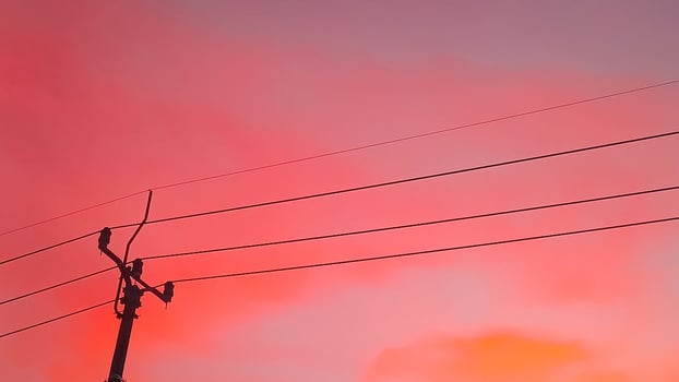 Serene Sunset Pink Skies and Street Cables photo