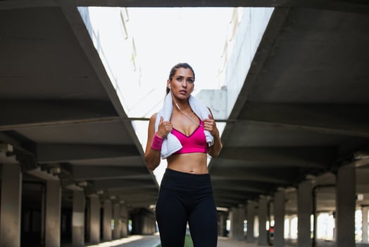 young beautiful woman jogging, fitness outfit, listening to music on headphones, smartphone, sea sunrise, skinny perfect slim body, healthy living lifestyle, summer, smiling, happy photo