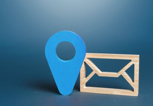 Envelope and blue location symbol. Delivery of correspondence and documents. Security and confidentiality. Send price lists, special offers for customers. Communication, e-mail newsletter. photo