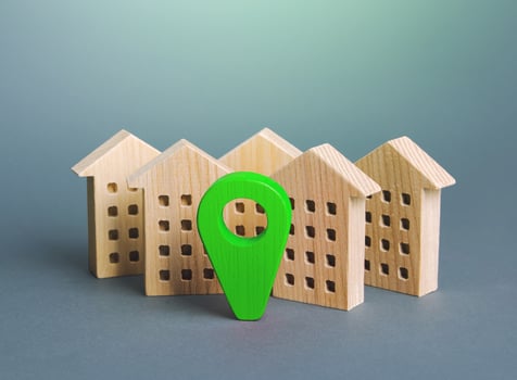 Residential buildings and location pin. Cities and destinations to visit. Delivery services. environmentally friendly, saving resources. Green energy. Modern eco housing. Search for housing options photo