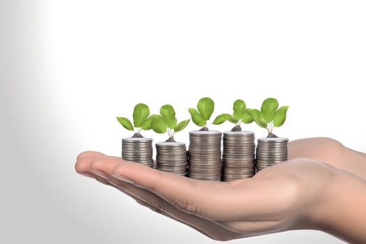 Growth finance concept. Plant growing on the coin in hand for wealth saving money and investment success on white background. photo