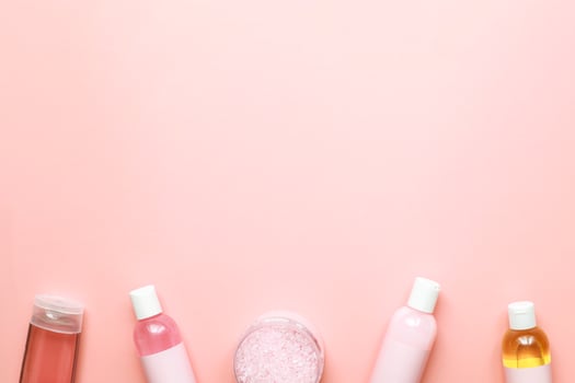Flat lay spa jars. Mockup jars. Flatlay beauty on pink background photo