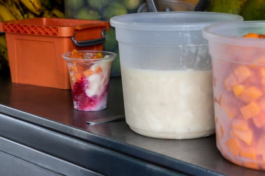 Preparation of a traditional sweet water ice with fruits called cholado in the city of Cali in Colombia photo