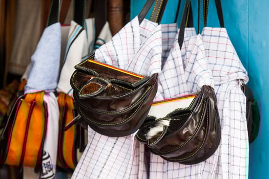 Colombian traditional leather satchel from the Antioquia Region called Carriel and poncho photo