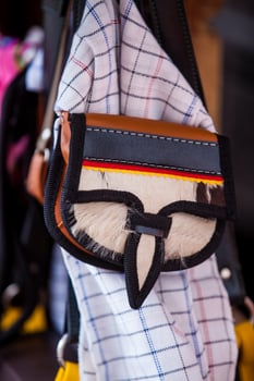 Colombian traditional leather satchel from the Antioquia Region called Carriel and poncho photo