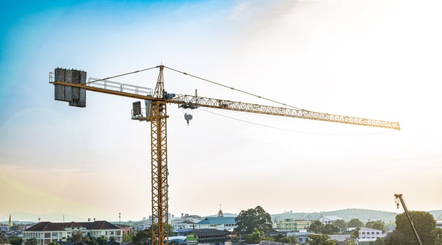 Large construction site including  cranes working, Real estate industry. sunrise sky background. Steel frame structure,buildings at construction site . construction machinery. city center photo