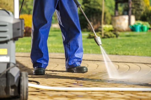 Worker and Pressure Washer photo