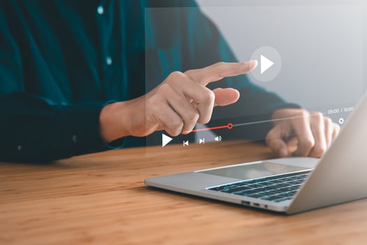 the man touching play icon on video online. video content creator concept. photo