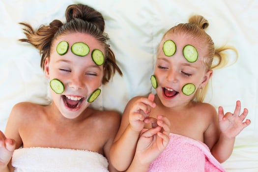 Beautiful girl with facial mask of cucumber. photo