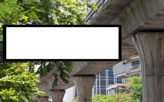 Outdoor LED display billboard with mock up white screen on footpath. clipping path for mockup photo