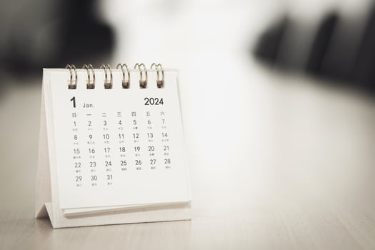 Calendar page January of the year 2024 white color in meeting room in office. with copy space and business design. concept of planning and setting new strategic goals. photo