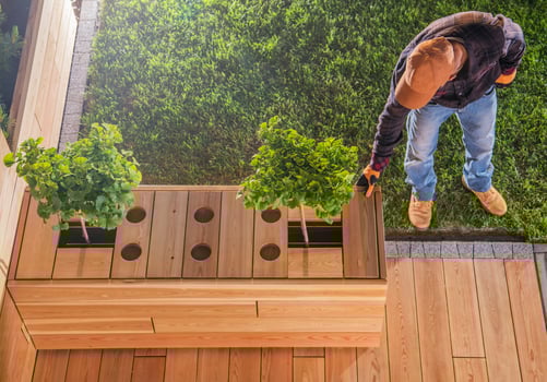 Wooden Deck And Table Project In Backyard Garden. photo