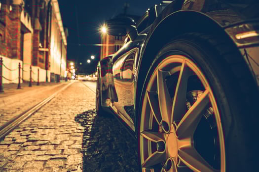 Modern Car on the City Street at Night. photo