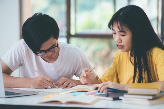 An asian students are reading books and study, Tutoring together. photo