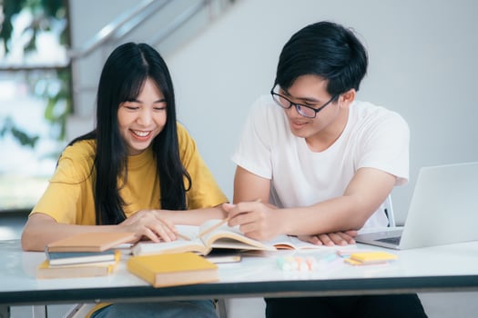 An asian students are reading books and study, Tutoring together. photo