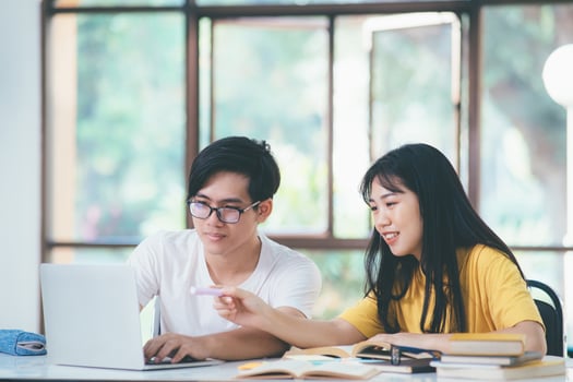 An asian students are reading books and study, Tutoring together. photo