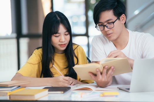 An asian students are reading books and study, Tutoring together. photo