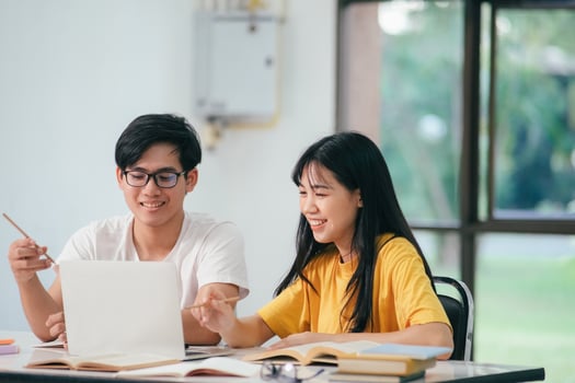 An asian students are reading books and study, Tutoring together. photo
