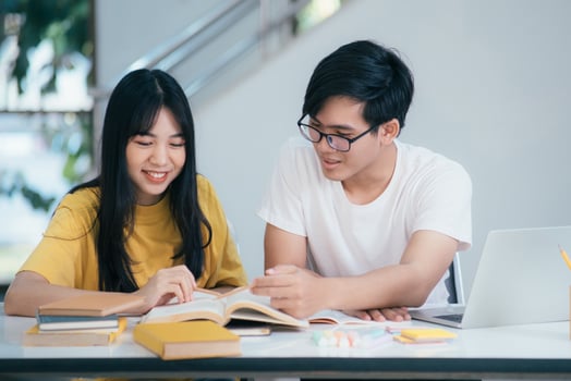 An asian students are reading books and study, Tutoring together. photo