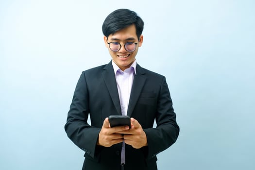 Portrait of businessman using smartphone. photo
