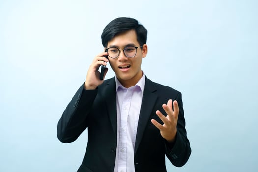 Portrait of businessman talking on phone. photo