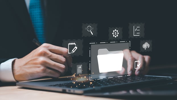 office worker working with document folder ,Management of corporate data storage ,ERP document system management ,accountant Audit documents , quality assessment management With a checklist photo