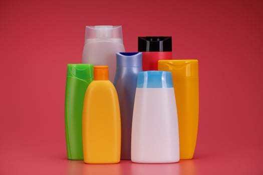 Blank Label Shampoo Bottles or Shower Gel on Pink Background photo