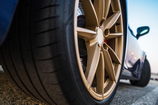 Sport Looking Vehicle Golden Alloy Wheels photo