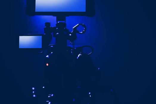 Pro Digital Motion Picture Camera in a Blue Stage Light photo
