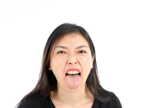 Facial Expression Young Asian woman office attire white background tongue stick out photo
