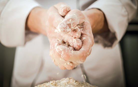 Kitchen Chef Preparing Organic Dough For a Bake photo