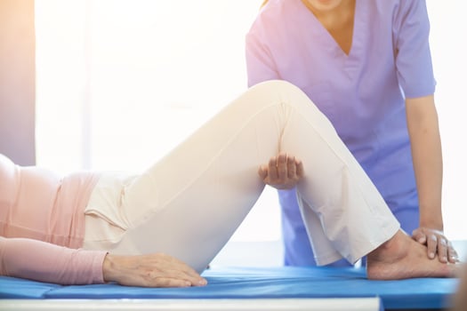 Physical therapists are helping elderly people to take care of themselves after a long period of recovery and they need regular physical therapy to help their bodies recover. physical therapy concept photo