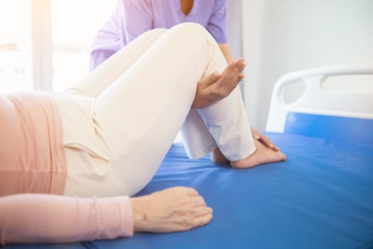 Physical therapists are helping elderly people to take care of themselves after a long period of recovery and they need regular physical therapy to help their bodies recover. physical therapy concept photo