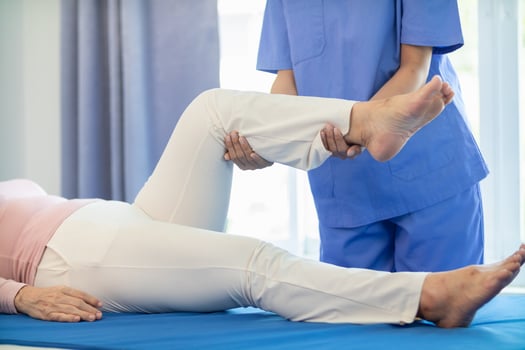 Physical therapists are helping elderly people to take care of themselves after a long period of recovery and they need regular physical therapy to help their bodies recover. physical therapy concept photo