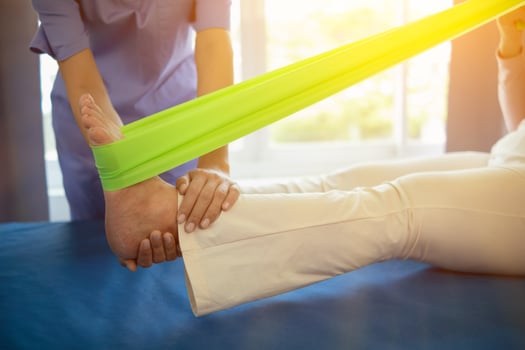 Physical therapists are helping elderly people to take care of themselves after a long period of recovery and they need regular physical therapy to help their bodies recover. physical therapy concept photo