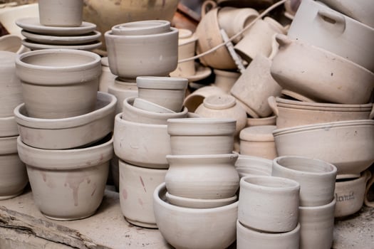 Ceramics on the elaboration process at a traditional factory at the small city of Raquira in Colombia photo