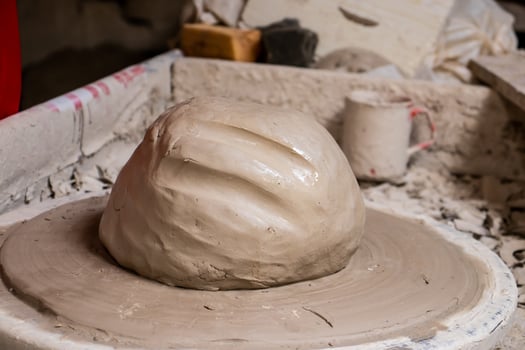 Ceramics on the elaboration process at a traditional factory at the small city of Raquira in Colombia photo