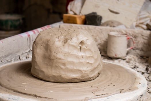 Ceramics on the elaboration process at a traditional factory at the small city of Raquira in Colombia photo