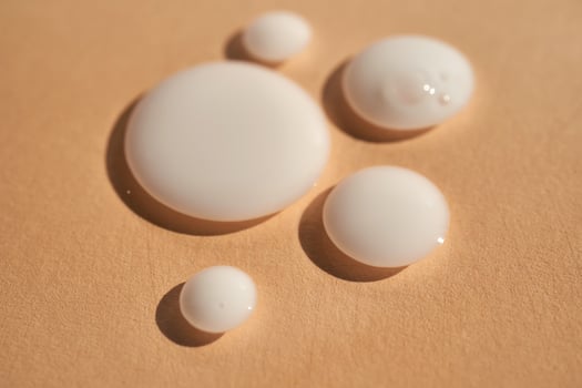 Drops of white milk consistency. photo