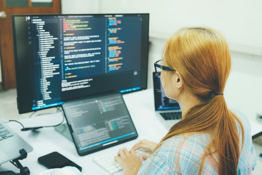 Programmer is coding and programming software. photo